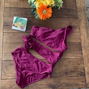 One piece with tie cutout